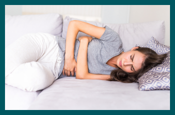 Types of stomach pain in women & possible causes