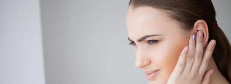 How to open a blocked ear at home safely?