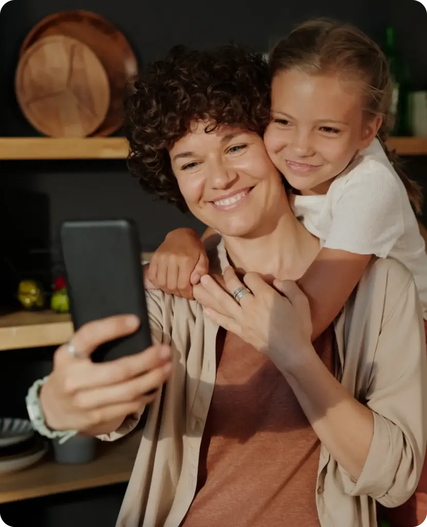 mother-daughter-on-phone-video-consult-hola-health